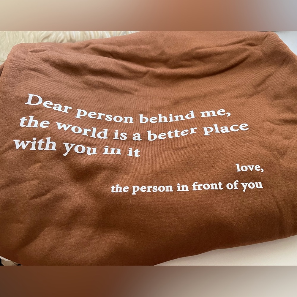 Brown hoodie never worn fits closer to a large.